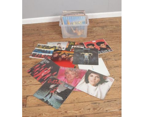 A box of vinyl records including Carpenters, Rod Stewart, Eagles, Elton John, Bee Gees, The Police, Wham!, Kool &amp; The Gan