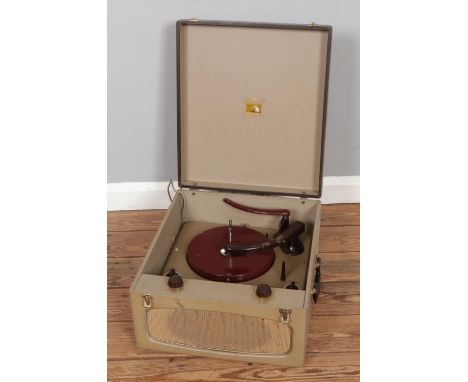 An early 20th century His Master's Voice bakelite suitcase record player.  Can be power on.