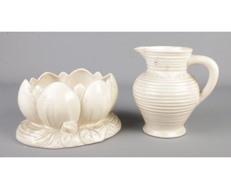 A Clarice Cliff Newport pottery lily bowl, model 973 along with a Clarice Cliff Newport pottery jug, 564 George.  Chip to bas