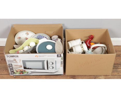 Two boxes of Poole Pottery collection, in large quantity, including "Delphis" red glaze duck figurine, C107 large cucumber di