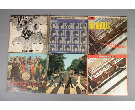 A good collection of six The Beatles records including A Hard Days Night, Revolver, Please Please Me, The Beatles 1962-1966, 