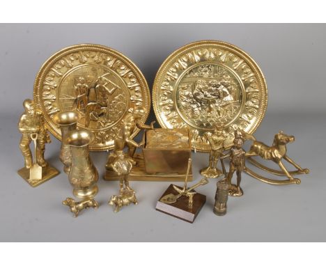 A collection of assorted brassware to include several mining related figures, small dog figures, pair of Indian vases, rockin