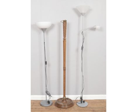 Three floor lamps, including an oak standard lamp and two modern lamps.  Two modern lamps are in working condition (H152cm/18