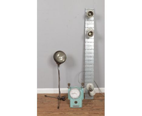 A quantity of industrial and upcycled lighting, to include spotlight on tripod base and Parkinson Cowan gas meter base.
