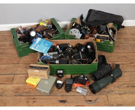 Three boxes of cameras and equipment/accessories including flash guns, lenses, Kodak Brownie, scopes etc.