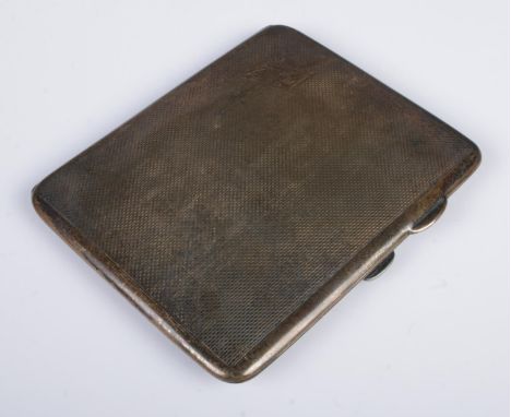 A George V silver cigarette case, with hinged opening, engine turned engraving and 'A.Q' monogram to the cover. Assayed for B