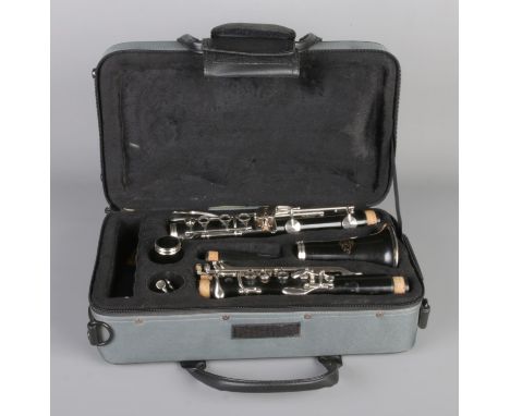 A Japanese J. Michael clarinet, marked "AK15151" in a travel backpack-style hard case.