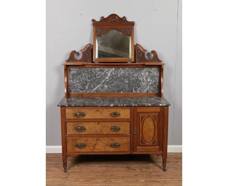 A Victorian walnut wash stand/chiffonier. With marble top, adjustable mirror and raised on castors. Approx. dimensions 118cm 