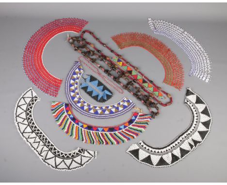 A collection of tribal and Eastern beaded jewellery, to include large necklaces and beaded chokers and collars.