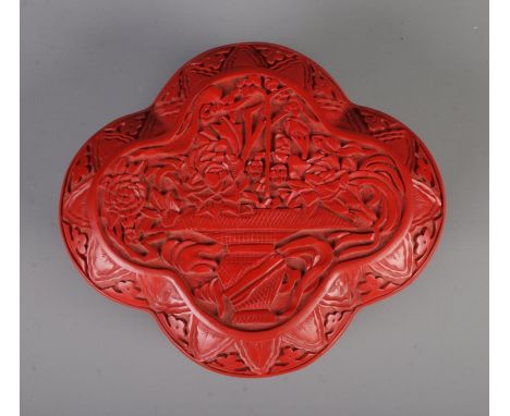 A Chinese quatrefoil cinnabar lacquer box with floral carved design Hx6.5cmWx15.5cmDx13.5cm