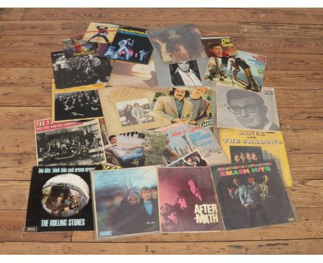 A small collection of records including The Rolling Stones (After-Math, Between The Buttons, Big Hits) Jimi Hendrix Experienc