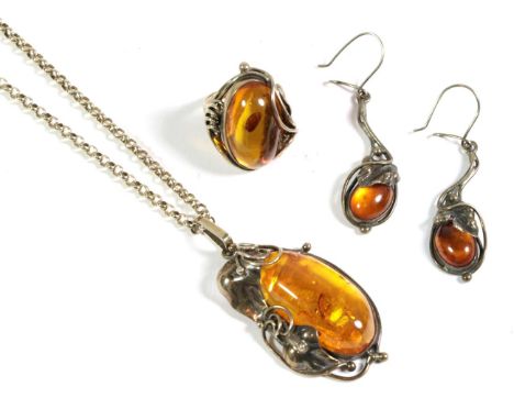 An amber and silver necklace, ring and earring suite.  Gross weight - 44.23 grams.