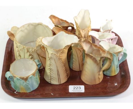 Nine Royal Worcester leaf moulded jugs, the tallest 13cm and two Royal Worcester sucriers(12)