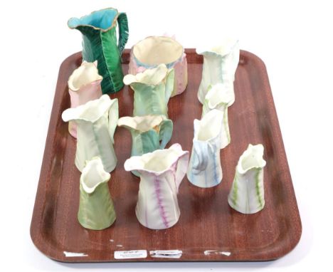 Eleven Royal Worcester leaf moulded jugs, tallest 13cm and a Royal Worcester sucrier (12)
