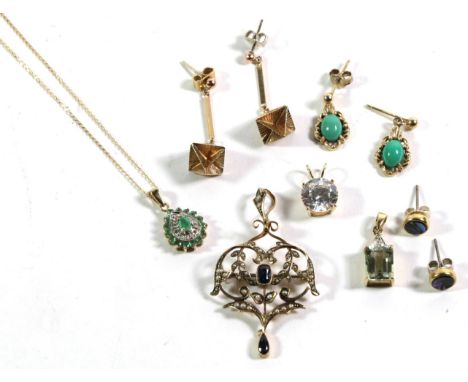 A solitaire cubic zirconia pendant stamped '14K'; a pendant stamped '375' on a fine link chain stamped 375, pendant length 2c