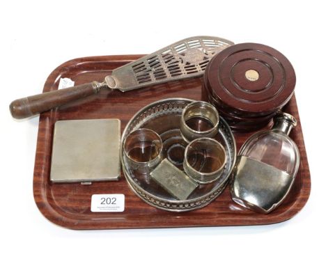 A set of six silver inset turned mahogany coasters, a 19th century silver plated fish slice with turned wooden handle, silver