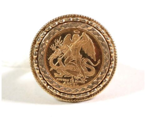 An Isle of Man half sovereign, mounted as a 9 carat gold ring, finger size O1/2.  Gross weight - 8.17 grams. 