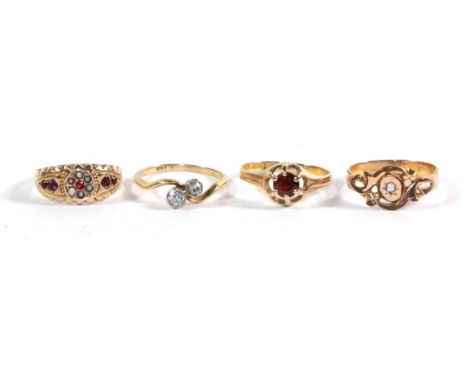 A 9 carat gold garnet and seed pearl ring, finger size M1/2; a 15 carat gold garnet ring, finger size P; a seed pearl ring, f