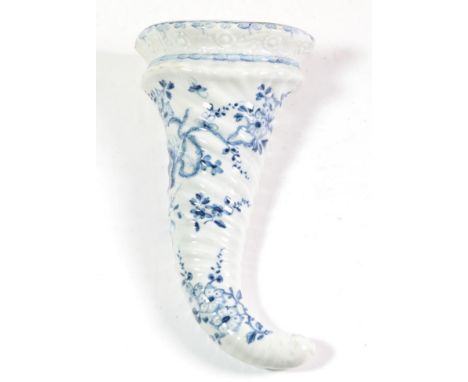 A first period Worcester porcelain cornucopia wall pocket, circa 1760, painted in underglaze blue with the Cornucopia Prunus 