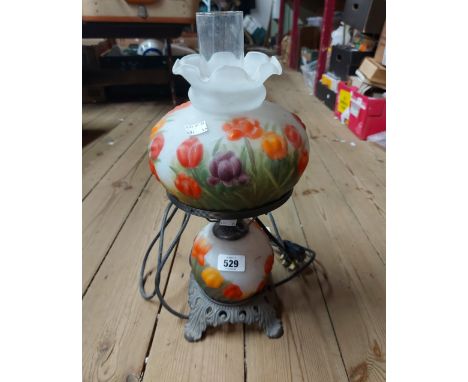A vintage Laura Ashley reverse painted glass lamp, on decorative pierced base