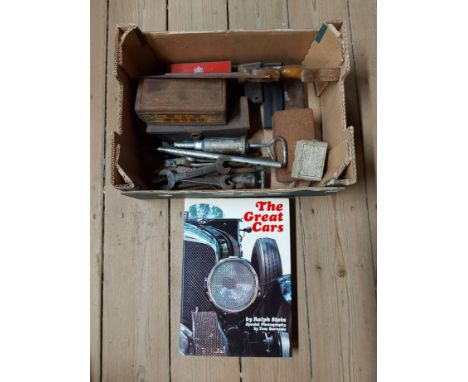 A box containing a quantity of vintage tools and sundries including saws, spanners, a penny whistle and a book entitled 'The 