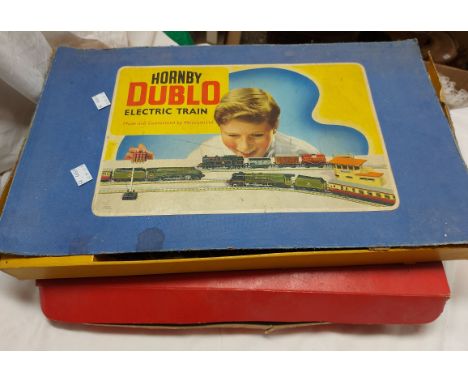 A boxed Hornby Dublo electric train set with an extra engine and other items - sold with a Tri-ang large station set box with