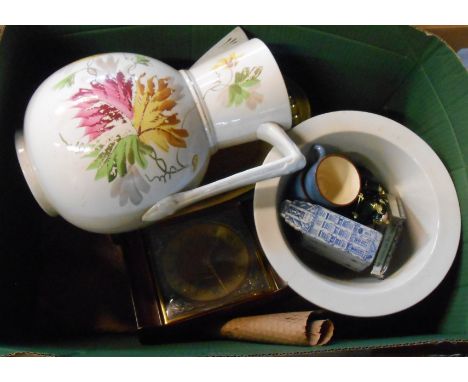 A box containing a quantity of ceramics and collectable items including toilet jug, mantel clock, etc.