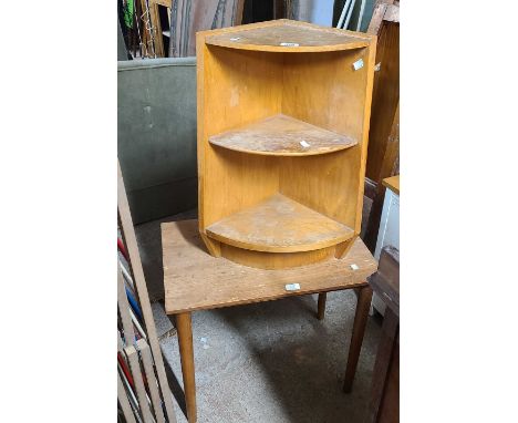A retro Hunt walnut three tier corner shelf unit - sold with a stained hardwood tea table, set on tapered legs