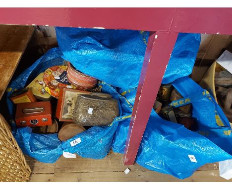 Three bags containing vintage advertising tins including Huntley &amp; Palmer examples, Rowntrees coco, etc.