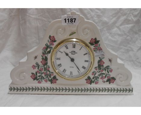 A Portmeirion pottery mantel clock decorated in the 'Botanic Garden' pattern with quartz movement