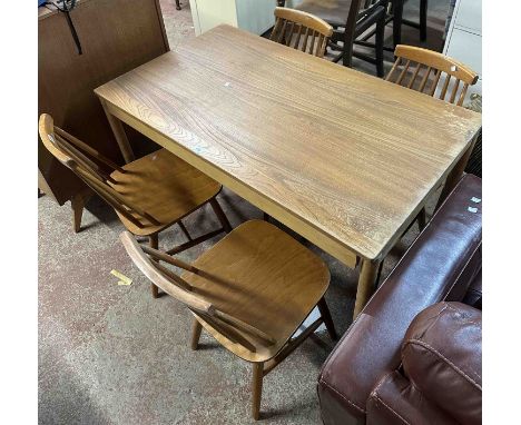 A set of four vintage Ercol style stick back kitchen chairs with moulded sectional seats, set on square supports