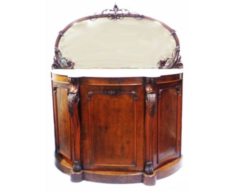 A 1.24m Victorian mahogany bow front chiffonier with ornate mirror set raised back, shaped marble top, flanking acanthus cabr