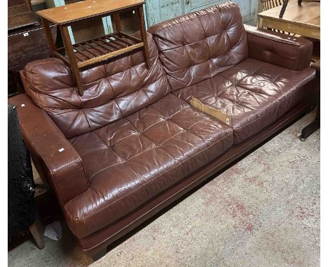 A 2.04m vintage brown leather upholstered box frame settee with stitched detail, set on square tapered feet