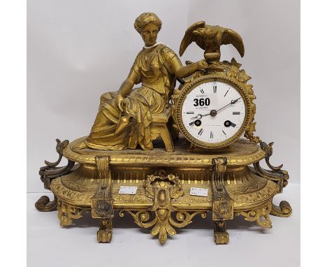 A late 19th Century gilt spelter cased mantel clock with classical female figure and eagle, the dial marked for F.H. Goulding