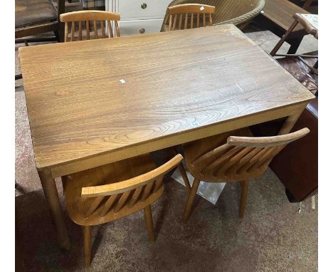 A 1.22m Ercol kitchen table with light elm top, set on tapered legs