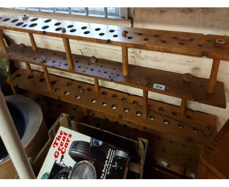 A four tier shelf unit made from wood reclaimed from an old Welsh organ