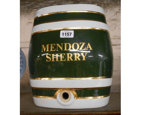 A large ceramic Sherry barrel with green banded decoration and gilt Mendoza Sherry label