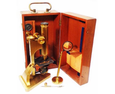 A mahogany cased R. &amp; J. Beck of London brass microscope, with accessories