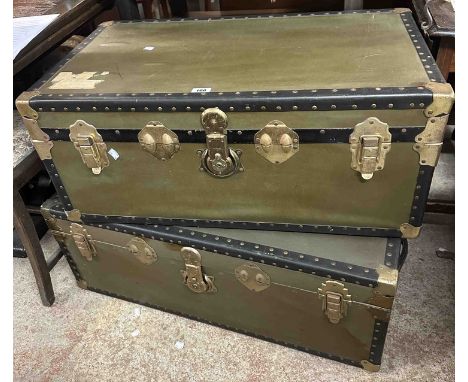 A 92cm vintage travelling trunk with black bound green finish - sold with an 85cm matching trunk