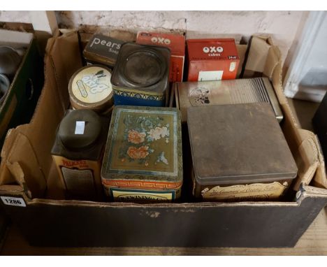 A box containing a quantity of vintage advertising tins including French Twinings, Weetabix, etc.