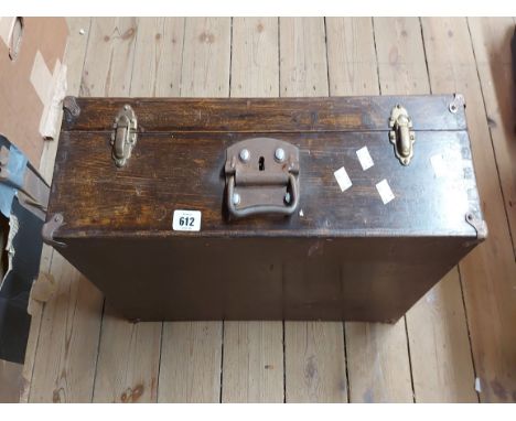 A vintage wooden tool chest with carrying handle