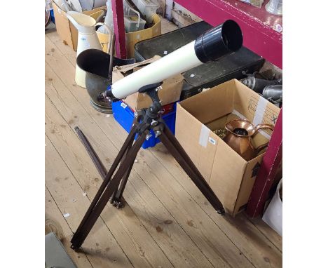 A vintage Unicon astronomical telescope in cardboard box