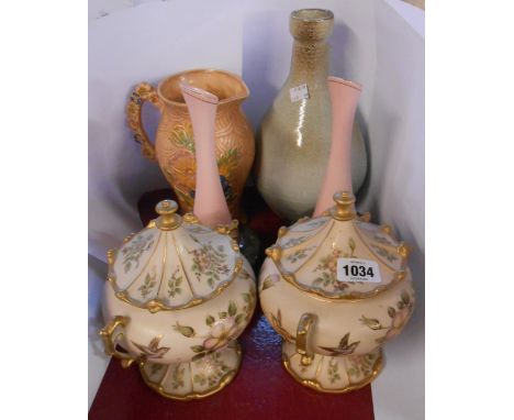 A quantity of ceramics including a pair of Carltonware vases, a pair of Continental lidded jars, etc.