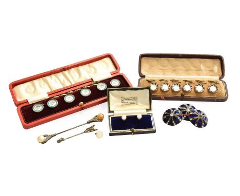 Two cultured pearl dress studs, cased; two cased sets of enamel and mother-of-pearl buttons; a paste arrow brooch; a simulate