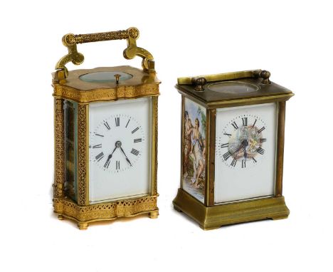 A brass striking and repeating carriage clock, circa 1900, and an enamel panelled carriage timepiece, circa 1910 (2)The strik