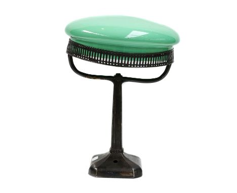 An Art Deco table lamp with opaque turquoise shade, another table lamp surmounted with a pottery figure of a maiden and a thi