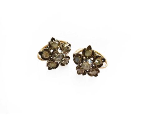 A pair of diamond cluster earrings, with hook fittingsThe earrings are in fair condition with slight damages throughout and l