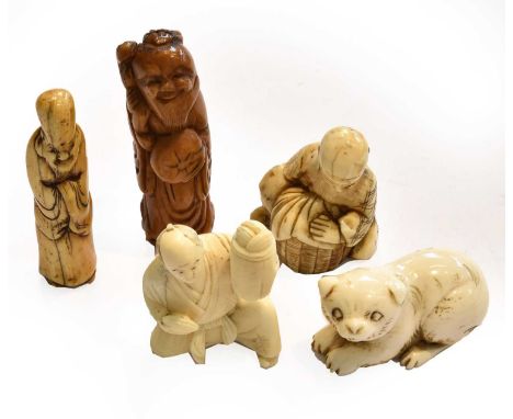 A Japanese Edo period carved ivory netsuke formed as a sage; together with three other netsuke one formed as a dog, a small o