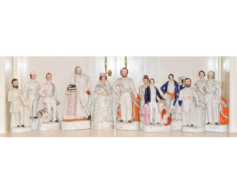 A collection of Victorian and later large size Staffordshire portrait figures including King and Queen of Prussia, Victoria a
