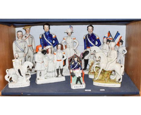 A collection of Victorian Staffordshire portrait figures, mainly military, including Napoleon, Lord Kitchener, Baden Powell a